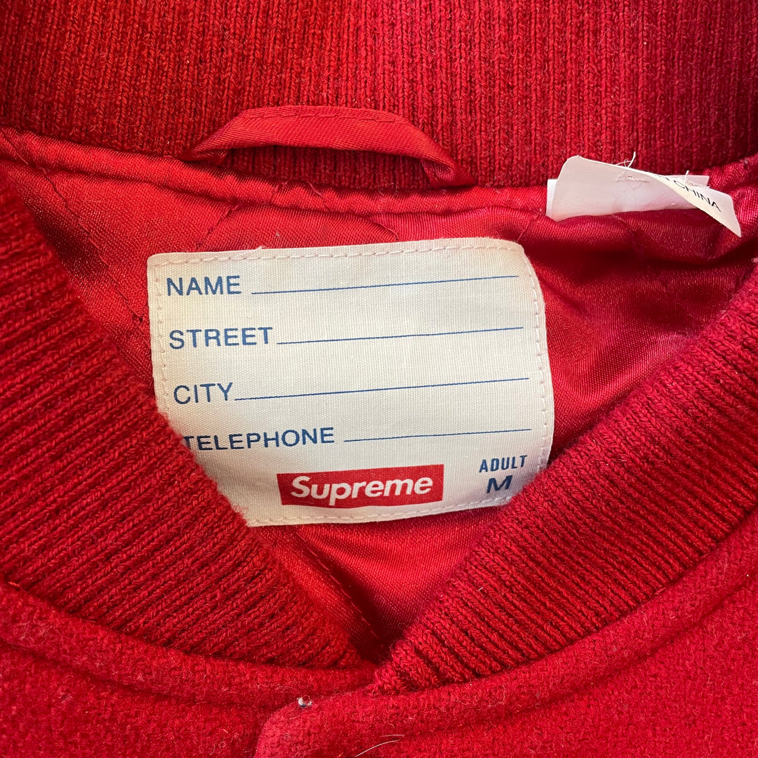CHAQUETA SUPREME VARSITY X AEON FLUX